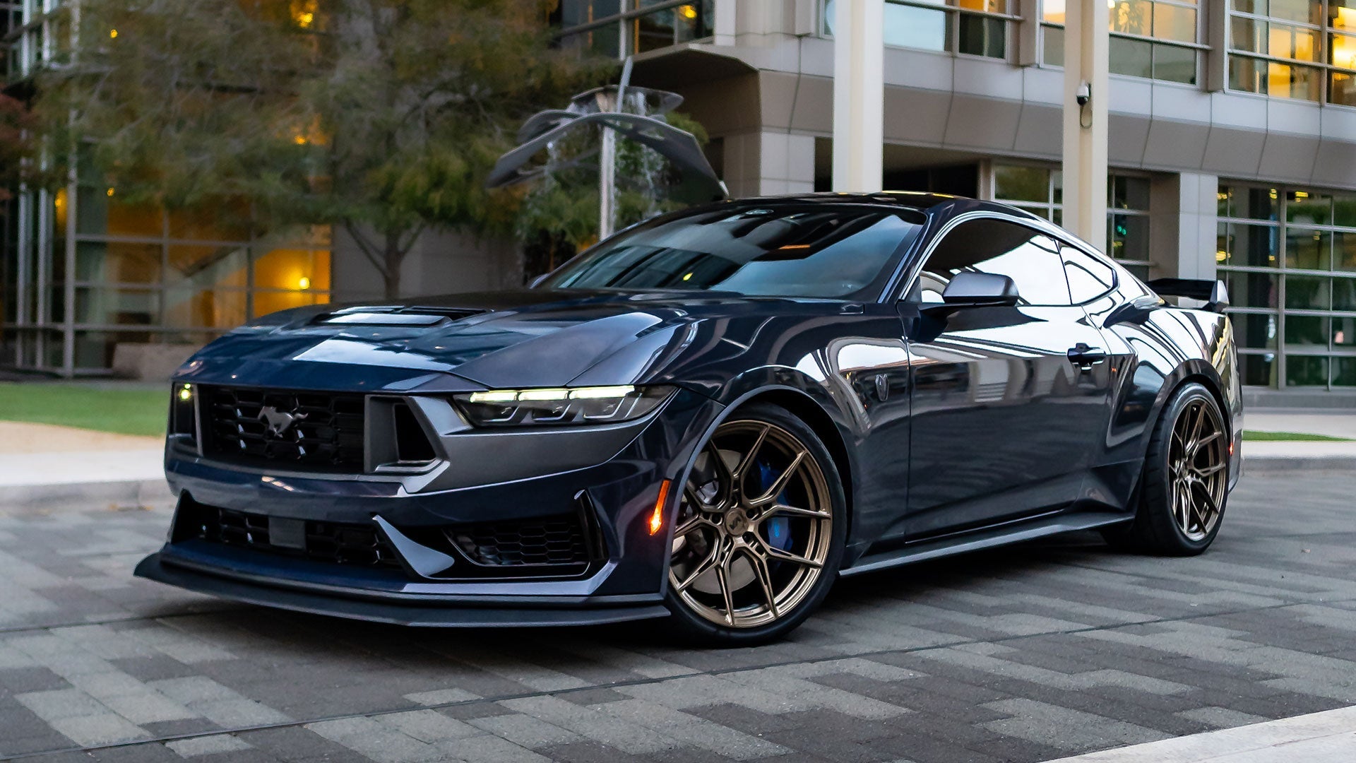 Front view of Ford Mustang S650 Dark Horse with Satin Bronze Nysa wheels.